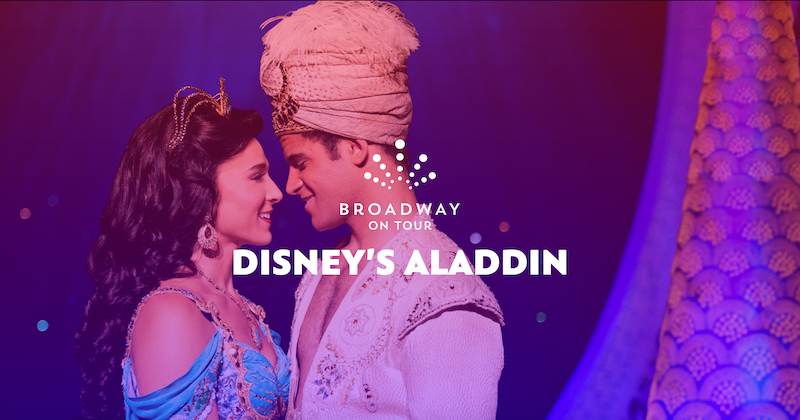 A promotional photo showing Aladdin and Jasmine facing each other.