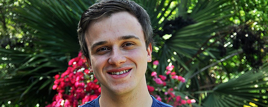 A portrait of Cole Williams in the UC Davis Arboretum