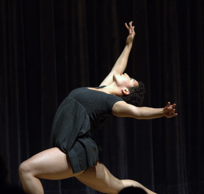 A dancer arching her back.