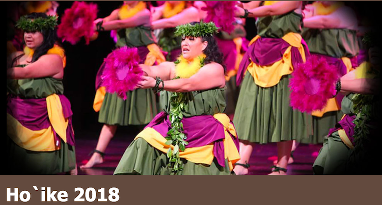 A photo of Hawaiian hula dancers.
