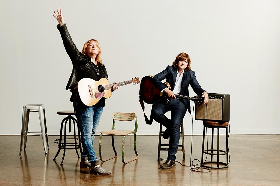 Emily Saliers and Amy Ray with their guitars and an amp.