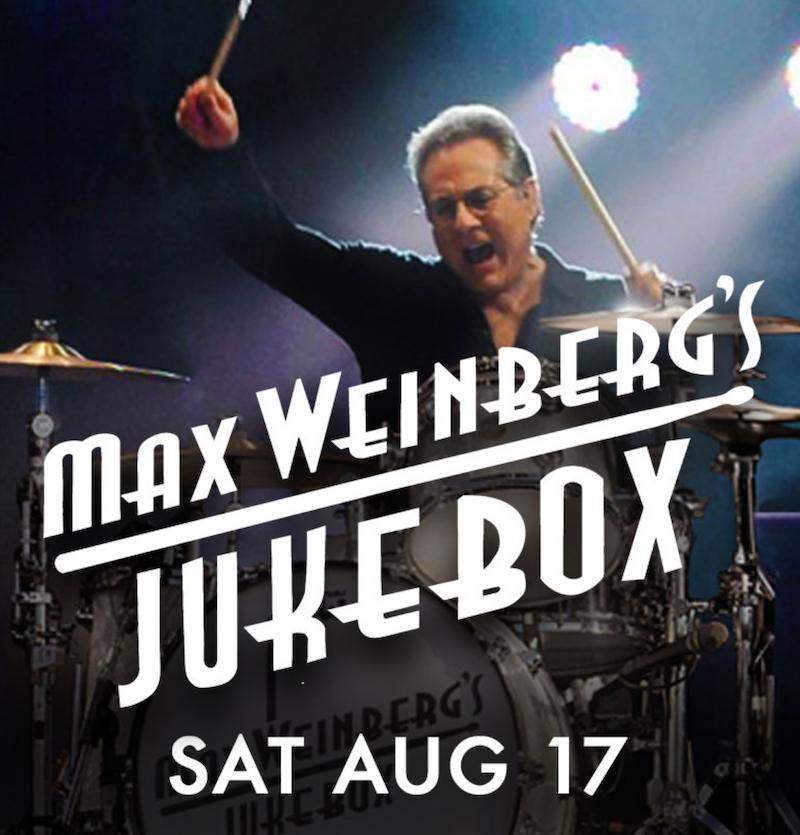 Max Weinberg playing the drums.