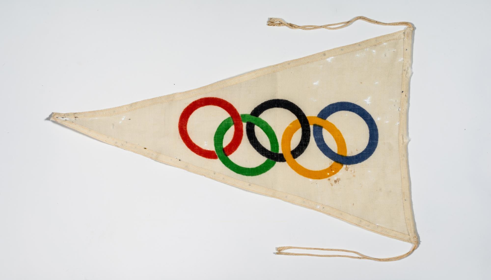 A pennant with the Olympic rings