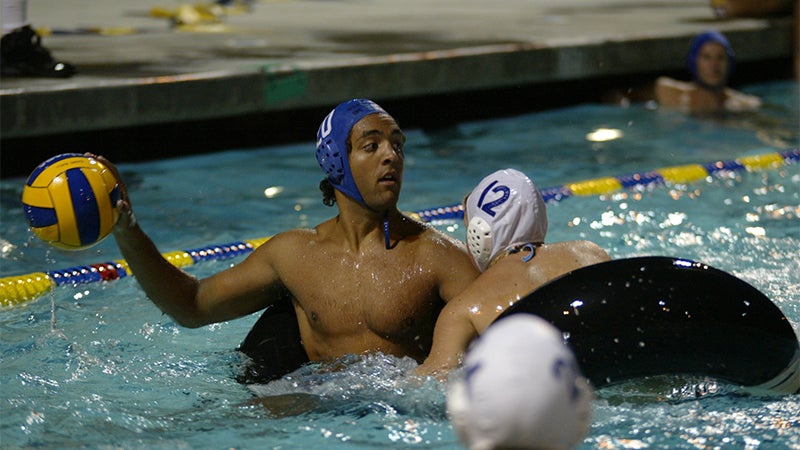 Men playing water polo